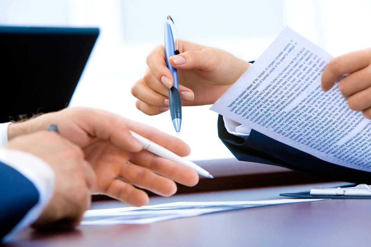 Separation agreement document being reviewed by solicitor and client